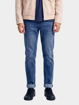 Quần Jean Thêu Chữ M Ở Túi Sau Form Slimfit QJ107